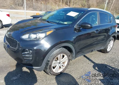 2018 Kia Sportage Lx z USA, uszkodzony, nr VIN KNDPMCAC9J7447013